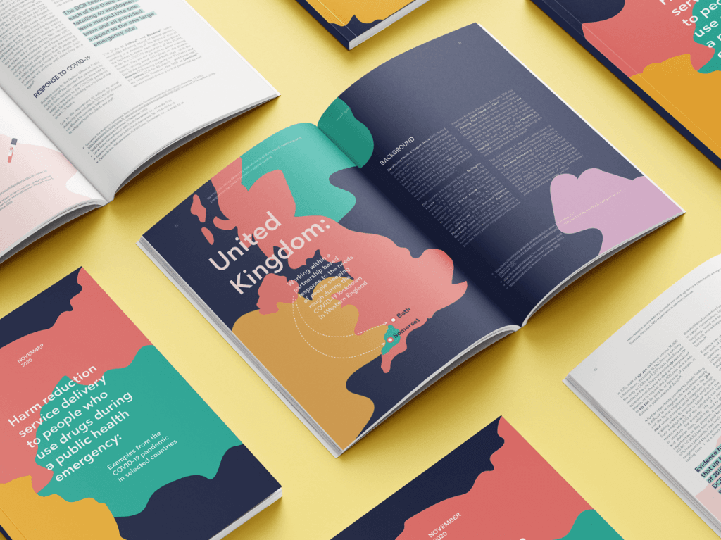 Report design with text "United Kingdom," navy blue background and various blobs of color on report page including teal, peach, and yellow.